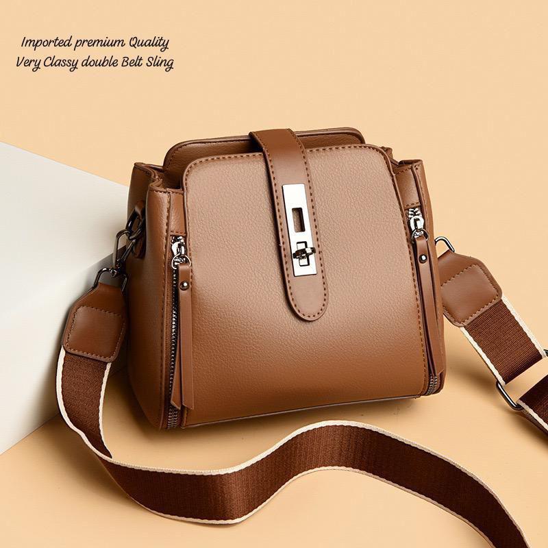 “Women’s Premium Double Belt Sling Bag – Stylish Leather Crossbody with Lock Design”