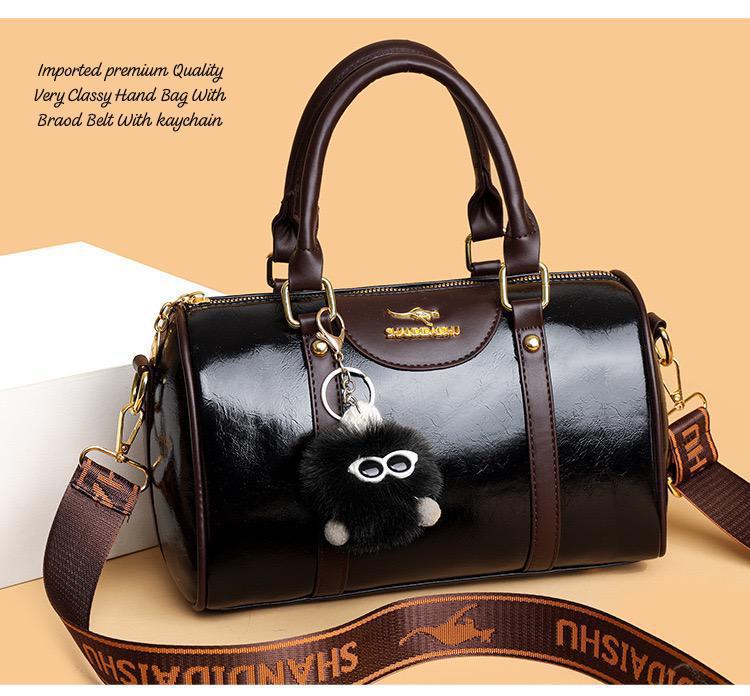 Premium Imported Designer Duffle Style Women’s Handbag with Broad Strap & Cute Keychain – Brown